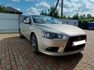 2011 Mitsubishi Lancer X Рестайлинг, бежевый, 600000 рублей, вид 2
