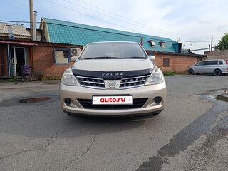 2010 Nissan Tiida I, золотистый, 645000 рублей, вид 2