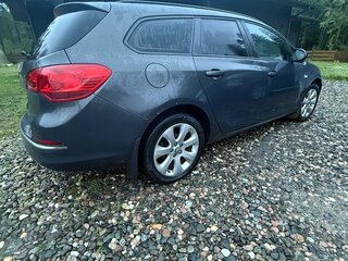 2013 Opel Astra J Рестайлинг, коричневый, 530000 рублей, вид 4