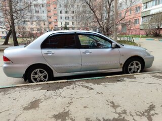 2009 Mitsubishi Lancer Classic IX Рестайлинг, серебристый, 415000 рублей, вид 4
