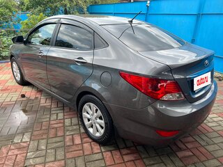 2013 Hyundai Solaris I, чёрный, 650000 рублей, вид 5