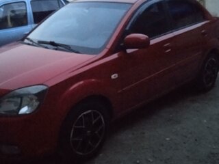 2010 Kia Rio II Рестайлинг, красный, 670000 рублей, вид 1