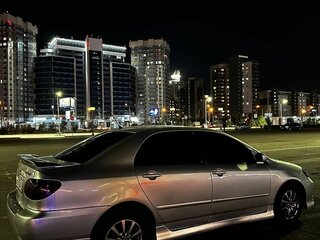 2003 Toyota Corolla IX (E120, E130), серебристый, 650000 рублей, вид 4