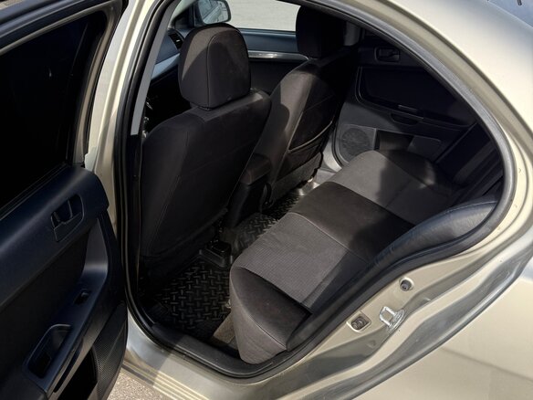 2009 Mitsubishi Lancer X, бежевый, 395000 рублей - вид 9