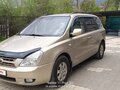 2009 Kia Carnival Grand II, золотистый, 1200000 рублей - вид 2