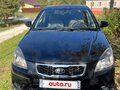 2011 Kia Rio II Рестайлинг, чёрный, 650000 рублей - вид 1