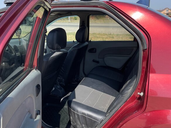2009 Renault Logan I, красный, 380000 рублей - вид 8