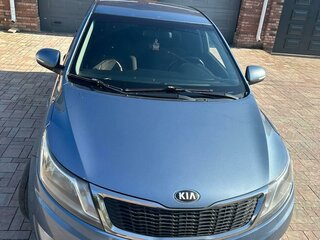 2013 Kia Rio 5-speed III, голубой, 1290000 рублей, вид 4