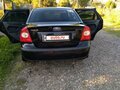 2006 Ford Focus II, чёрный - вид 2
