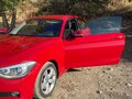 2012 BMW 1 серии 116i II (F20/F21), красный, 1340000 рублей - вид 6