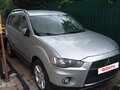 2011 Mitsubishi Outlander II Рестайлинг, серебристый, 905000 рублей - вид 2