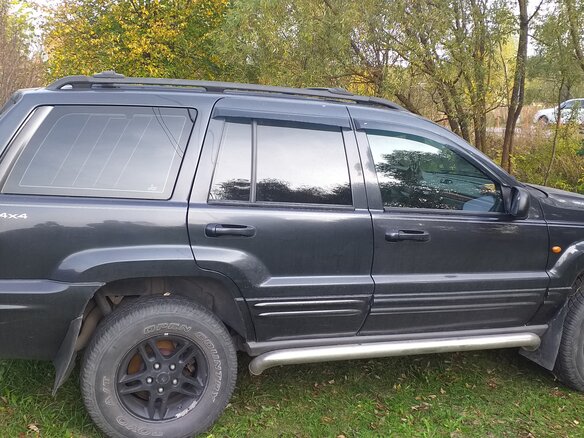 1999 Jeep Grand Cherokee II (WJ), чёрный - вид 1