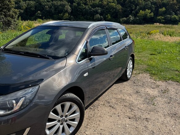2013 Opel Astra J Рестайлинг, серый, 740000 рублей - вид 9