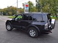 2001 Mitsubishi Montero III, чёрный, 750000 рублей - вид 2