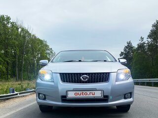 2007 Toyota Corolla Axio X (E140, E150), серебристый, 880000 рублей, вид 2