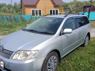 2004 Toyota Corolla Runx IX (E120, E130), серебристый, 649000 рублей, вид 1