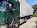 2001 Scania 4-Series, зелёный, 850000 рублей - вид 1