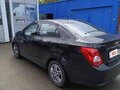 2012 Chevrolet Aveo II, чёрный, 700000 рублей - вид 3