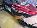 2004 Polaris Widetrak LX, красный