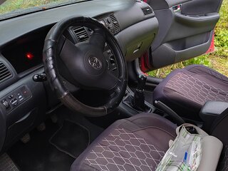 2004 Toyota Corolla IX (E120, E130) Рестайлинг, красный, 550000 рублей, вид 4