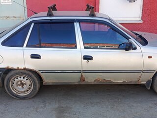 2006 Daewoo Nexia I, серебристый, 105000 рублей, вид 4