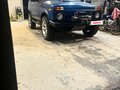 2005 Lada (ВАЗ) 2121 (4x4) I Рестайлинг, синий, 460000 рублей - вид 1