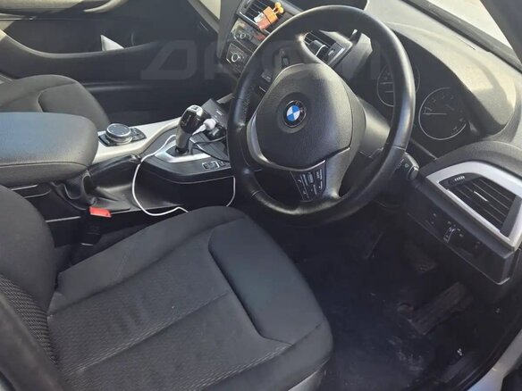 2016 BMW 1 серии 118i II (F20/F21) Рестайлинг, серый, 1300000 рублей - вид 4