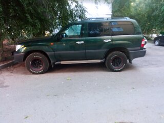 2005 Toyota Land Cruiser 105 100 Series Рестайлинг 2, зелёный, 2800000 рублей, вид 3
