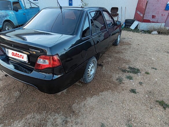 2011 Daewoo Nexia I Рестайлинг, чёрный, 115000 рублей - вид 1