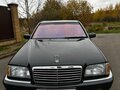 1994 Mercedes-Benz C-Класс 250 I (W202), чёрный, 600000 рублей - вид 1