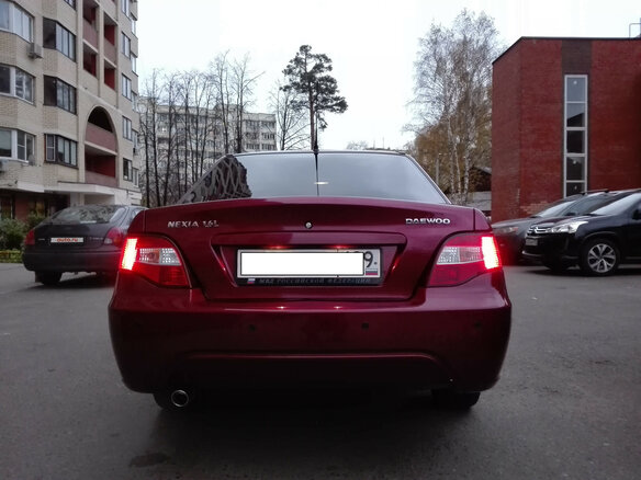 2009 Daewoo Nexia I Рестайлинг, красный - вид 2