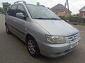 2003 Hyundai Matrix I, серебристый - вид 1