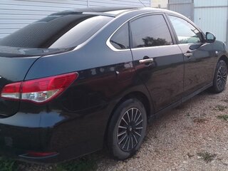 2014 Nissan Almera III (G15), чёрный, 560000 рублей, вид 4