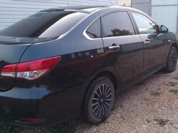 2014 Nissan Almera III (G15), чёрный, 560000 рублей - вид 3
