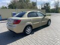 2010 Kia Rio II Рестайлинг, бежевый, 600000 рублей - вид 3