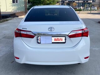 2013 Toyota Corolla XI (E160, E170, E180), белый, 1750000 рублей, вид 4