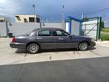 2000 Lincoln Town Car III, серый - вид 3