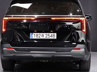 2025 Kia Carnival IV Рестайлинг, красный, 6215097 рублей, вид 4