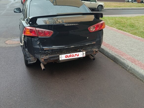 2007 Mitsubishi Lancer X, чёрный - вид 3