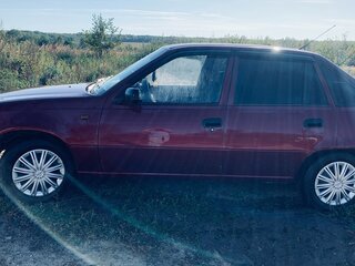 2010 Daewoo Nexia I Рестайлинг, пурпурный, 150000 рублей, вид 3
