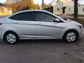 2016 Hyundai Solaris I Рестайлинг, серебристый, 650000 рублей, вид 2