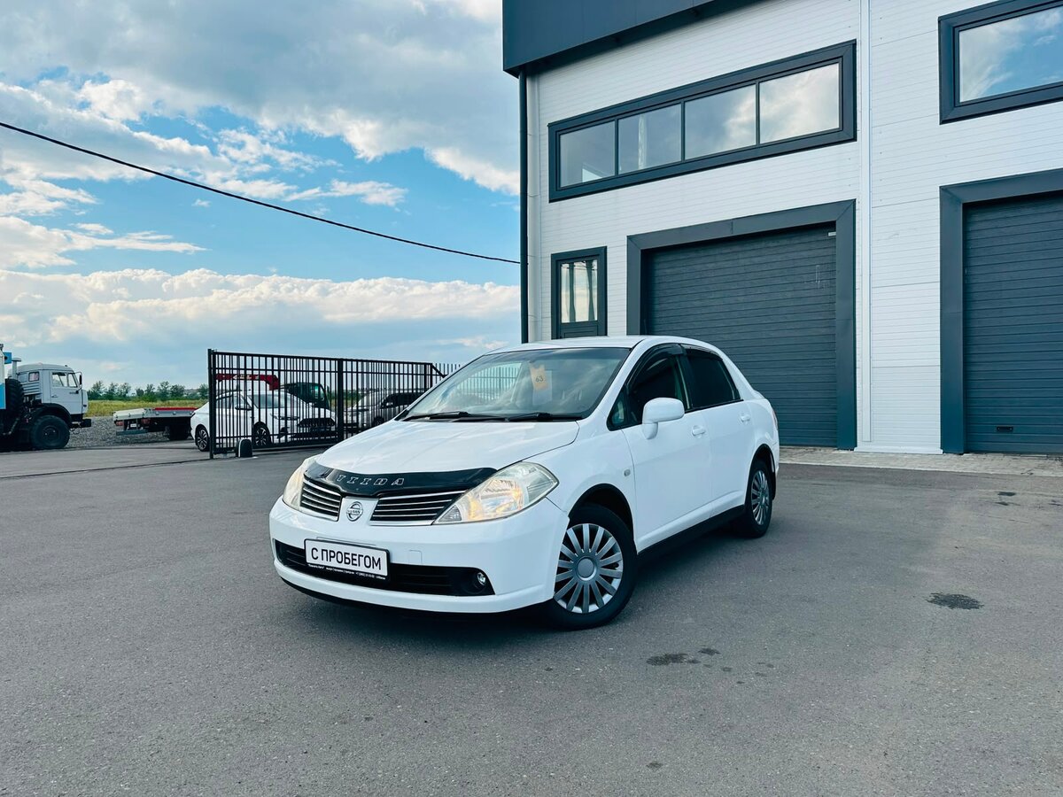 Открыть фотографии: Nissan Tiida I