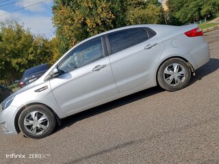 2011 Kia Rio 5-speed III, серебристый, 670000 рублей, вид 2