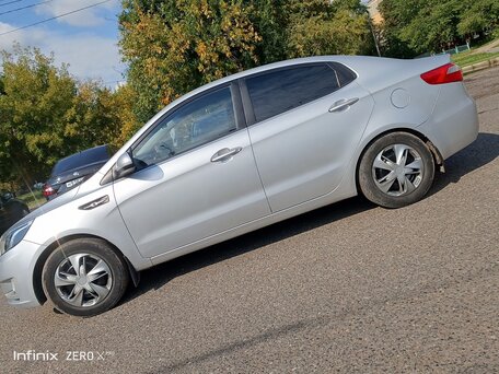 2011 Kia Rio 5-speed III, серебристый, 670000 рублей, вид 2