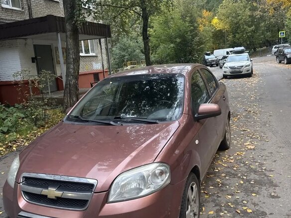 2011 Chevrolet Aveo I Рестайлинг, коричневый, 450000 рублей - вид 1