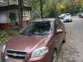 2011 Chevrolet Aveo I Рестайлинг, коричневый, 450000 рублей - вид 1