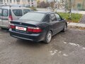 1998 Mazda 626 V (GF), синий, 150000 рублей - вид 1