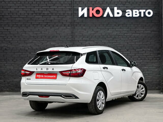 2024 Lada (ВАЗ) Vesta SW I Рестайлинг (NG), белый, 1450000 рублей, вид 4