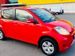 2009 Toyota Passo I (C10), красный, 520000 рублей, вид 2
