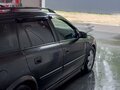 1999 Opel Astra G, чёрный - вид 1